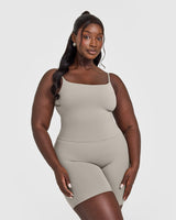 SoftMotion™ Strappy Mid Vest with Built in Bra Shelf with White Logo | Warm Sand