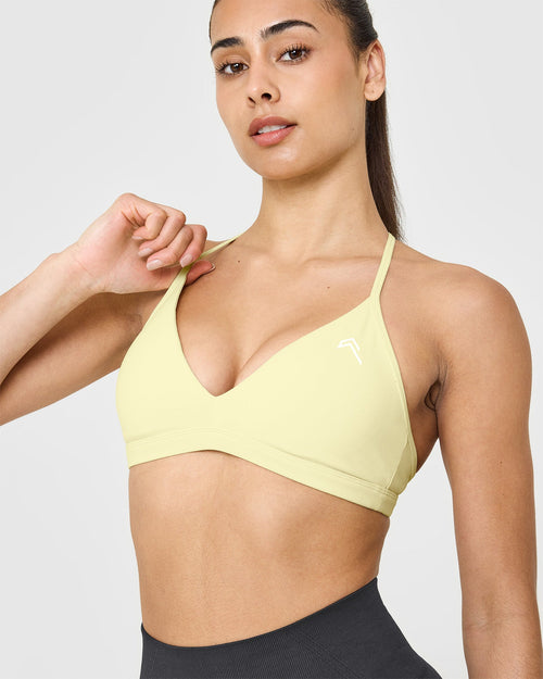 EasyLift™ Ultra Minimal V Neck Bralette with White Logo | Pastel Yellow