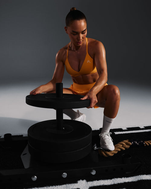 EasyLift™ Ultra Minimal V Neck Bralette with White Logo | Powdered Orange