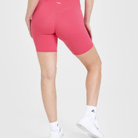 SoftMotion™ Cycling Shorts 8" with White Logo | Dark Velvet Pink