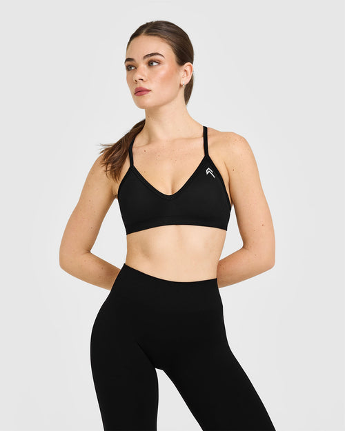 Oner Modal EnhanceLift™ Seamless Strappy Sports Bra with White Logo | Black