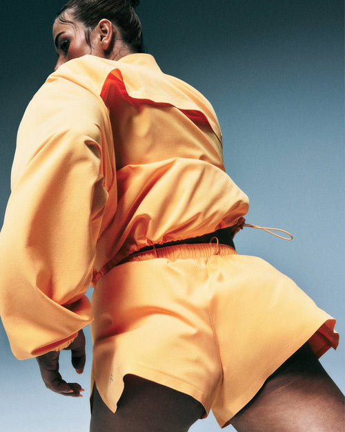 AirMove™ Lined Shorts 2" with Pocket | Powdered Orange