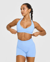 Effortless Seamless Halter Neck Sports Bra with White Logo | Powdered Blue
