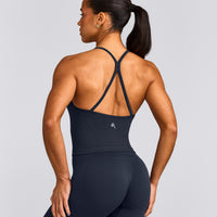 EnhanceLift™ Seamless Strappy Racer Vest with Built in Bra Shelf with Grey Logo | True Blue