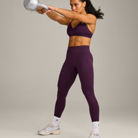 EnhanceLift™ Seamless Strappy Sports Bra with Grey Logo | Blackberry Purple