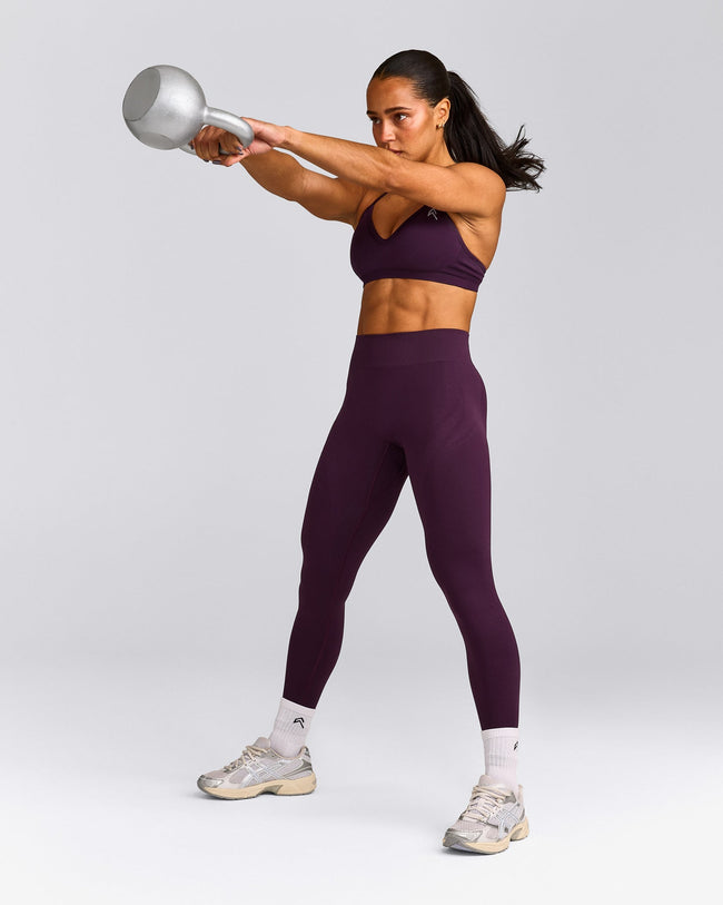 EnhanceLift™ Seamless Strappy Sports Bra with Grey Logo | Blackberry Purple