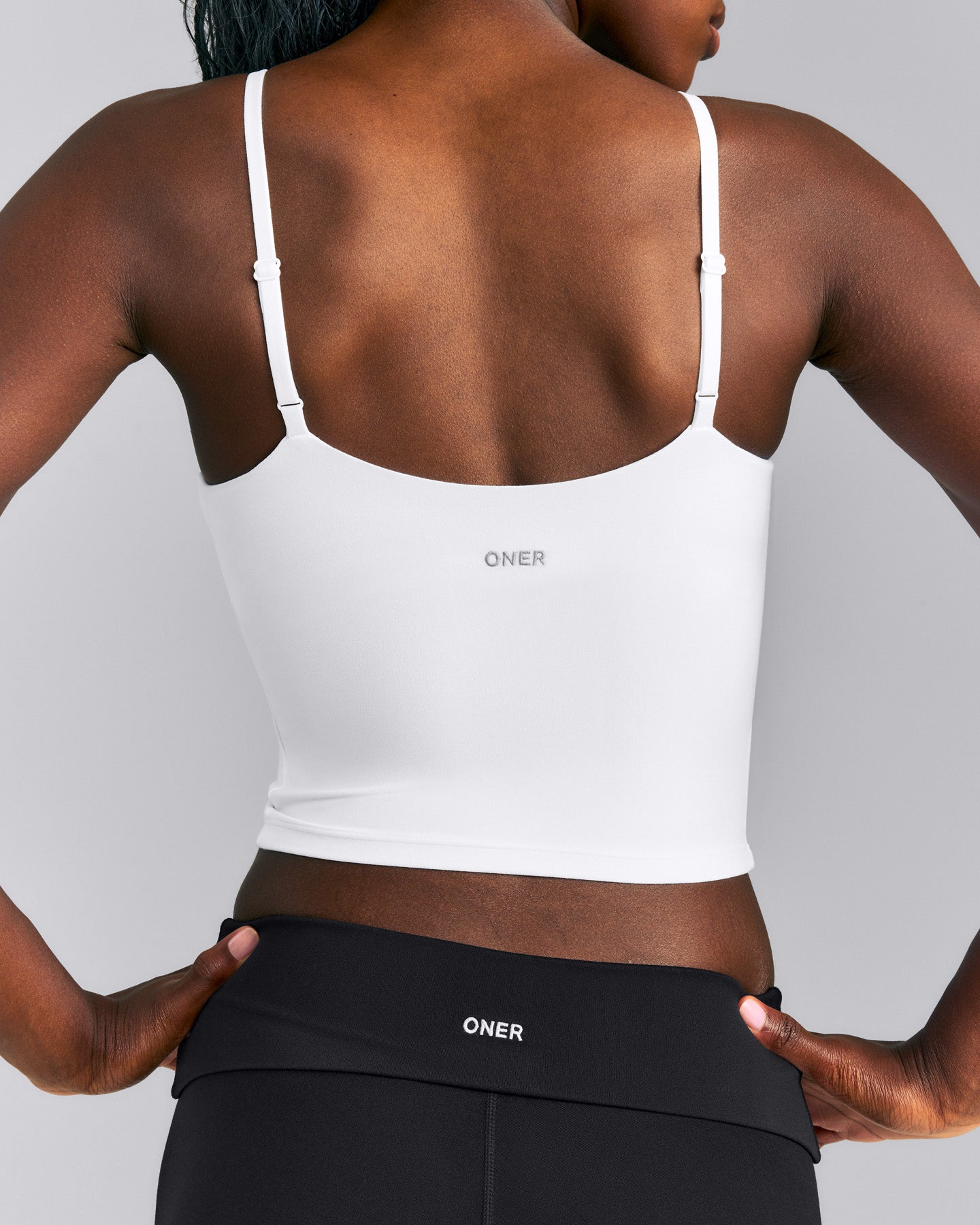 SoftMotion™ Adjustable V Neck Mid Tank Top with Built in Bra Shelf New Branding | White