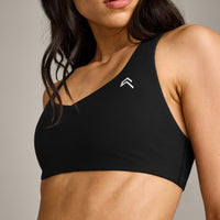 EasyLift™ Cross Back Sports Bra with Grey Logo | Black