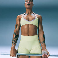 EnhanceLift™ Seamless Minimal Halter Neck Bralette with Grey Logo | Pastel Yellow