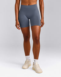 EffortlessLift™ Seamless Mid Rise Shorts with Gray Logo | Light Granite Blue