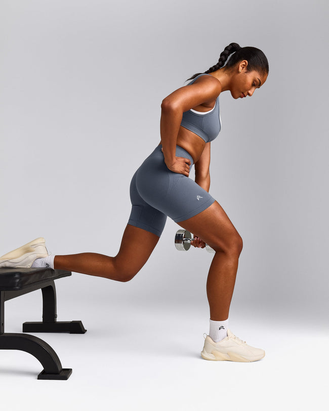 EffortlessLift™ Seamless Mid Rise Shorts with Gray Logo | Light Granite Blue