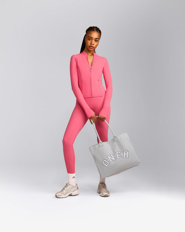 UnifiedMove™ Pocket Jacket with Reflective Logo | Hot Girl Pink
