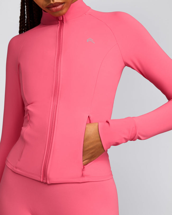 UnifiedMove™ Pocket Jacket with Reflective Logo | Hot Girl Pink