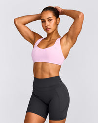 EasyLift™ Cross Back Sports Bra with Gray Logo | Chalk Pink