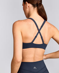 EasyLift™ Cross Back Sports Bra with Grey Logo | True Blue