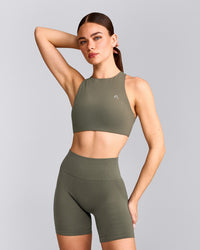 EasyLift™ High Neck Sports Bra with Grey Logo | Alpine Green