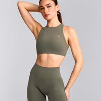EasyLift™ High Neck Sports Bra with Grey Logo | Alpine Green