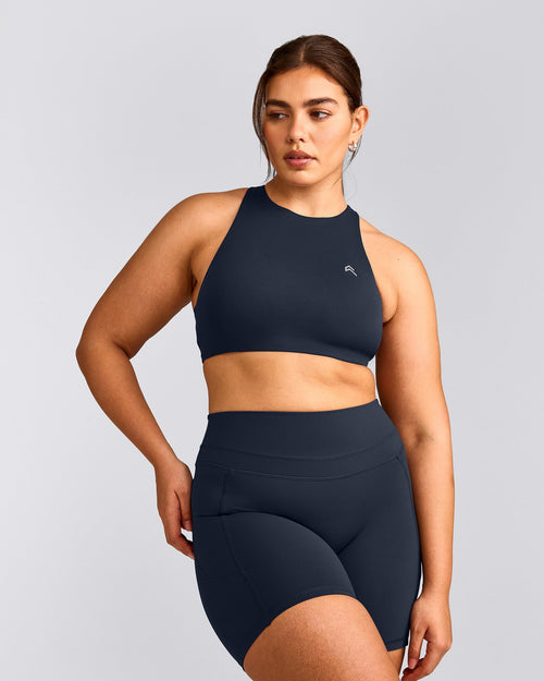 EasyLift™ High Neck Sports Bra with Gray Logo | True Blue