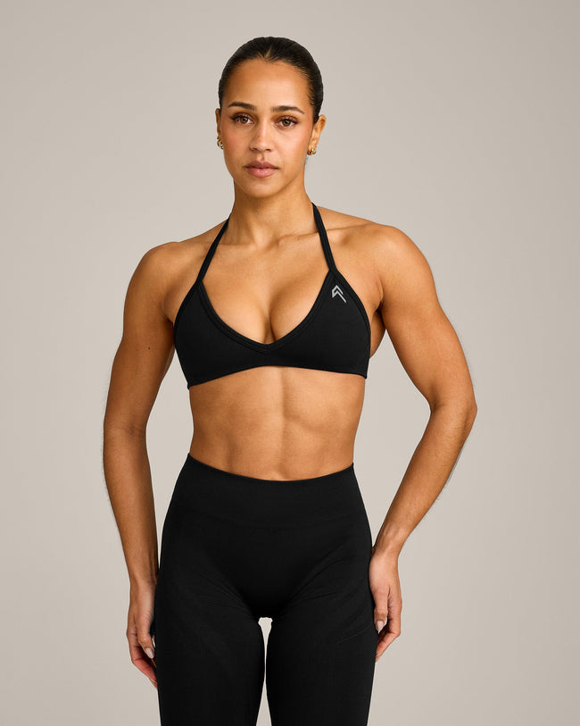 EnhanceLift™ Seamless Minimal Halter Neck Bralette with Grey Logo | Black