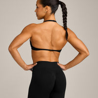 EnhanceLift™ Seamless Minimal Halter Neck Bralette with Grey Logo | Black