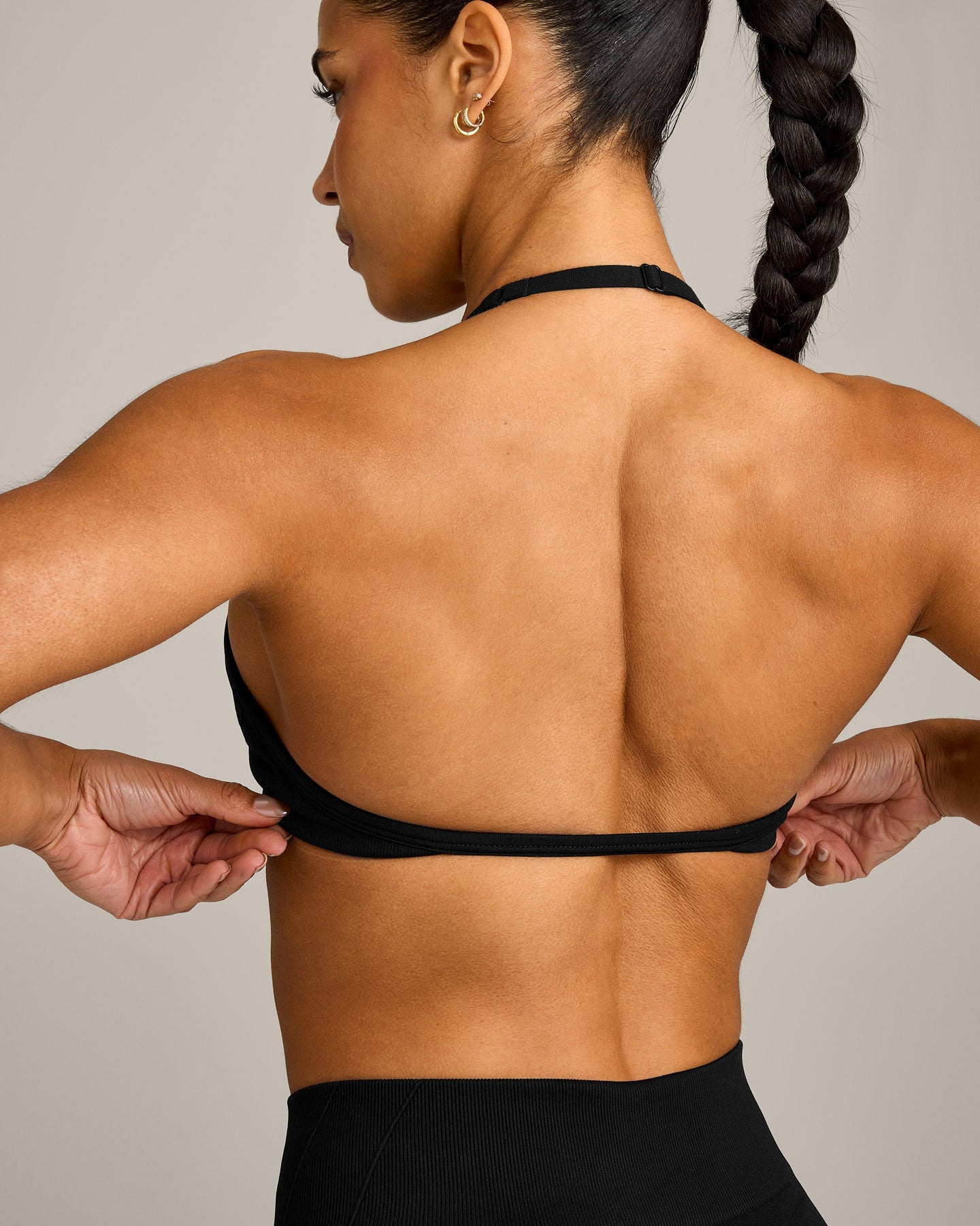 EnhanceLift™ Seamless Minimal Halter Neck Bralette with Grey Logo | Black