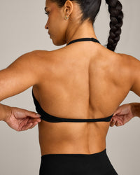 EnhanceLift™ Seamless Minimal Halter Neck Bralette with Grey Logo | Black