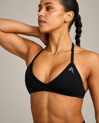EnhanceLift™ Seamless Minimal Halter Neck Bralette with Grey Logo | Black
