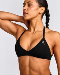 EnhanceLift™ Seamless Minimal Halter Neck Bralette with Grey Logo | Black