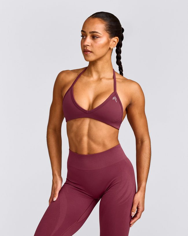 EnhanceLift™ Seamless Minimal Halter Neck Bralette with Gray Logo | Burnt Maroon Red