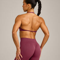 EnhanceLift™ Seamless Minimal Halter Neck Bralette with Grey Logo | Burnt Maroon