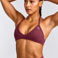EnhanceLift™ Seamless Minimal Halter Neck Bralette with Gray Logo | Burnt Maroon Red
