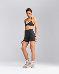 EnhanceLift™ Seamless Minimal Halter Neck Bralette with Grey Logo | Coal