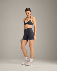 EnhanceLift™ Seamless Minimal Halter Neck Bralette with Grey Logo | Coal