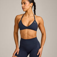EnhanceLift™ Seamless Minimal Halter Neck Bralette with Grey Logo | True Blue