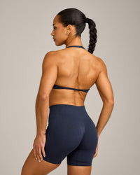 EnhanceLift™ Seamless Minimal Halter Neck Bralette with Grey Logo | True Blue