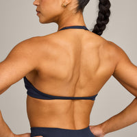 EnhanceLift™ Seamless Minimal Halter Neck Bralette with Grey Logo | True Blue