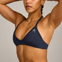 EnhanceLift™ Seamless Minimal Halter Neck Bralette with Grey Logo | True Blue