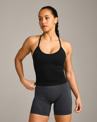 EnhanceLift™ Seamless Strappy Racer Vest with Built in Bra Shelf with Grey Logo | Black
