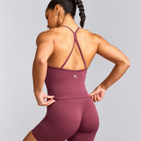 EnhanceLift™ Seamless Strappy Racer Vest with Built in Bra Shelf with Grey Logo | Burnt Maroon