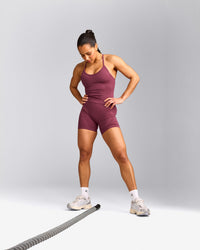 EnhanceLift™ Seamless Strappy Racer Vest with Built in Bra Shelf with Grey Logo | Burnt Maroon