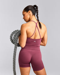 EnhanceLift™ Seamless Strappy Racer Vest with Built in Bra Shelf with Grey Logo | Burnt Maroon