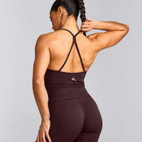 EnhanceLift™ Seamless Strappy Racer Vest with Built in Bra Shelf with Grey Logo | Plum Brown