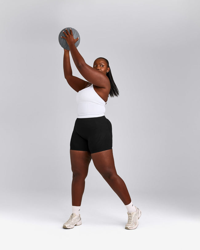 EnhanceLift™ Seamless Strappy Racer Vest with Built in Bra Shelf with Grey Logo | White