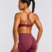 EnhanceLift™ Seamless Strappy Sports Bra with Grey Logo | Burnt Maroon