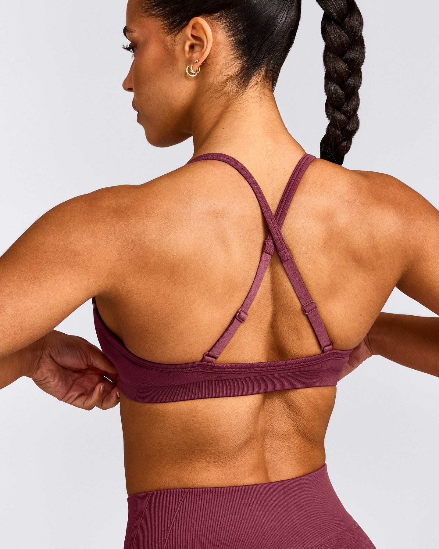 EnhanceLift™ Seamless Strappy Sports Bra with Grey Logo | Burnt Maroon