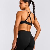 EnhanceLift™ Seamless Strappy Sports Bra with Grey Logo | Black