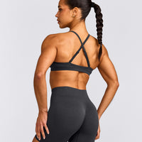 EnhanceLift™ Seamless Strappy Sports Bra with Grey Logo | Coal