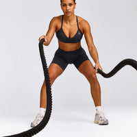 EnhanceLift™ Seamless Strappy Sports Bra with Grey Logo | Coal