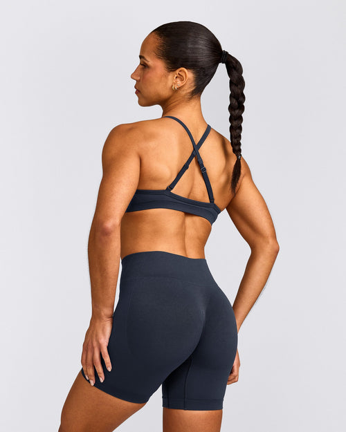 EnhanceLift™ Seamless Strappy Sports Bra with Gray Logo | True Blue