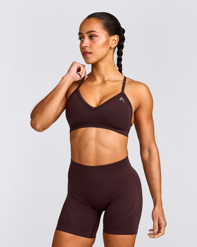 EnhanceLift™ Seamless Strappy Sports Bra with Grey Logo | Plum Brown